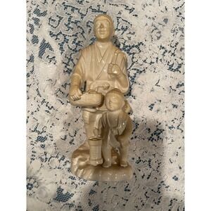 Vintage Hand Painted Japan Porcelain Figurine Man Child Carrying Goods